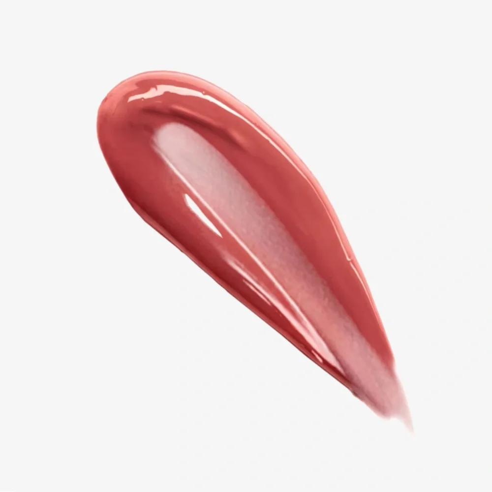 BUXOM Plump Shot Lip Serum in Plump Peach visibly plumps lips + improves